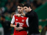 Arsenal manager Mikel Arteta pictured with Fabio Vieira on March 9, 2023